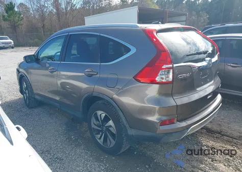 2016 Honda Cr-V Touring z USA, uszkodzony, nr VIN 5J6RM3H97GL004260